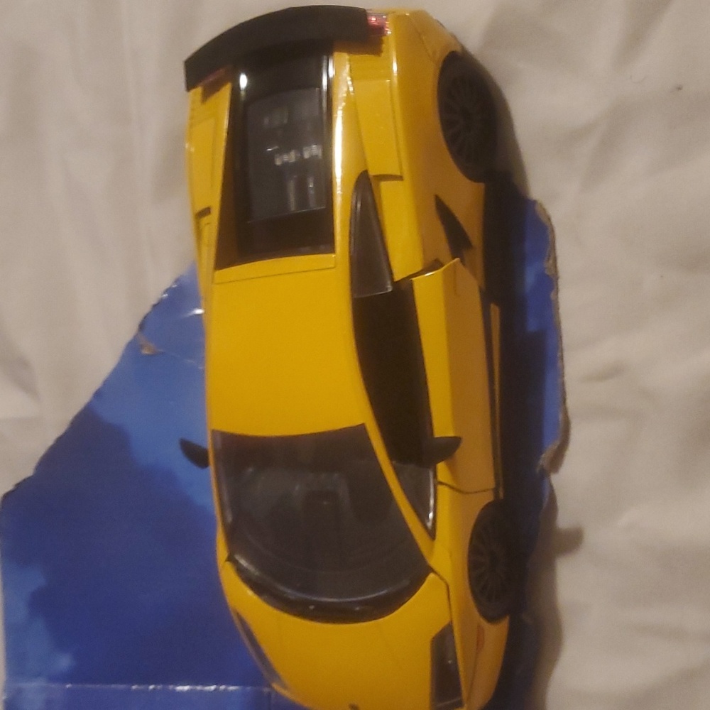 Yellow and black toy sports car